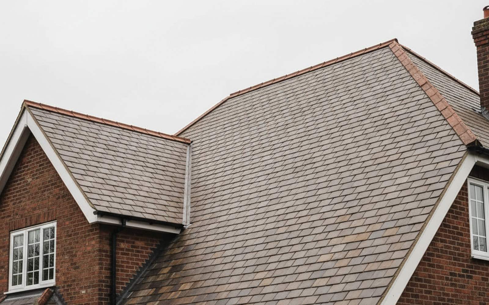 A completed clay tile roof on a detached house in Sutton Coldfield